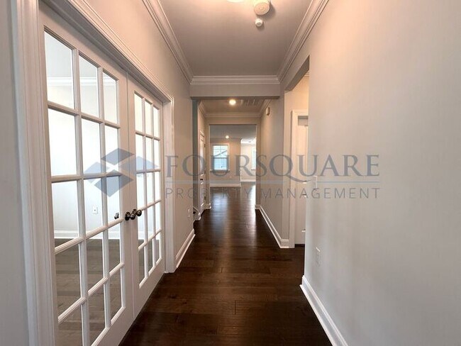 Building Photo - Spacious Corner-Lot Home with Guest Suite, Screened Porch & Detached 2-Car Garage – Resort-Style ...