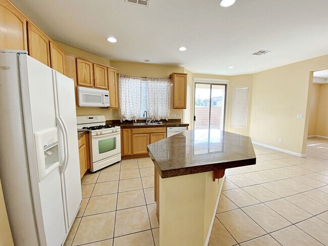 Building Photo - 4 BEDROOM HOME 3 CAR GARAGE ON A CORNER LO...