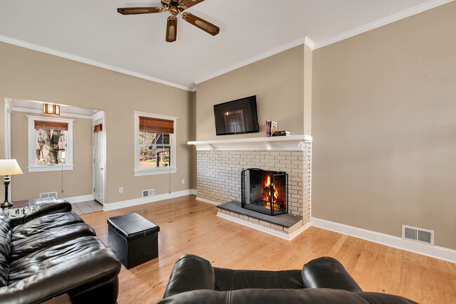 Mantle with beautiful woodwork - 1500 Cambridge Dr