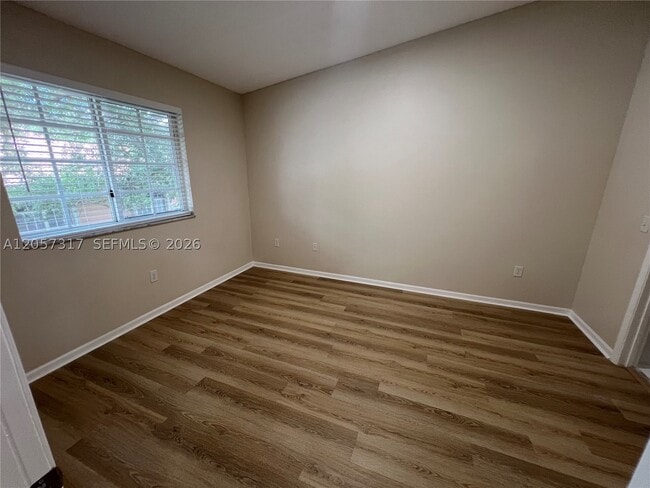 Building Photo - 202 Sable Palm Way