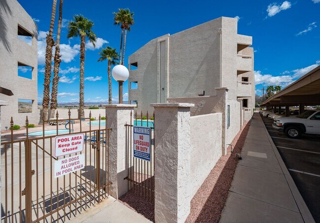 Building Photo - Waterfront 2BR 2B Condo Lower Level, gated with tennis,pool,spa,PRIVATE BEACH/DOCK