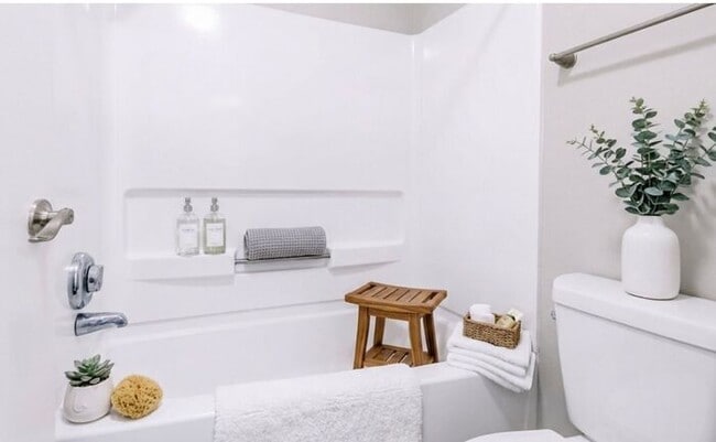 Building Photo - Spacious 2-Bedroom Elite Apartment with Private Balconies & Washer/Dryer