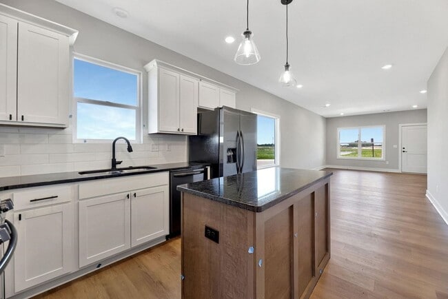 Building Photo - Modern 3-Bed Ranch in Maize – Zero-Entry L...