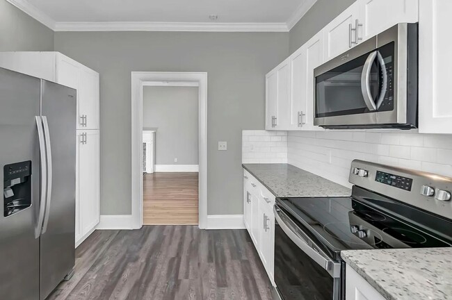 Building Photo - Beautifully renovated and repurposed house