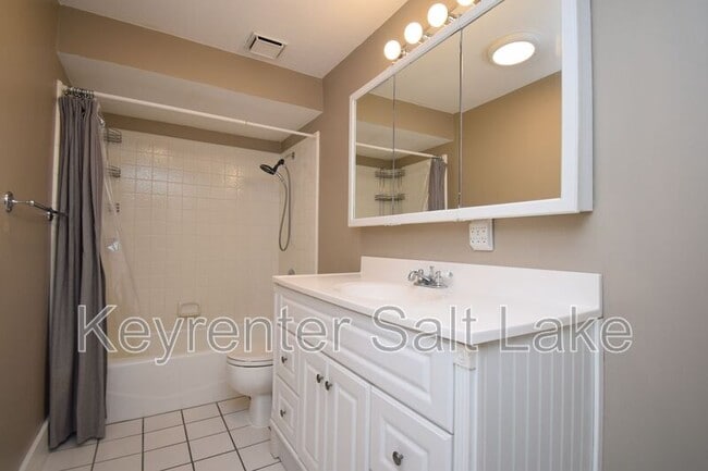 Building Photo - 6888 Hillside Village Cir