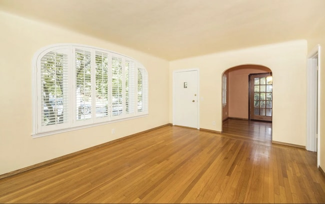 Building Photo - Charming Spanish Style Cottage with Incredible Deck- Gardener's Delight!