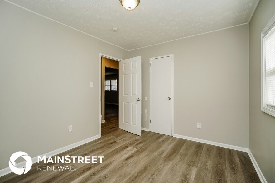 Building Photo - 5103 Dimson Dr N
