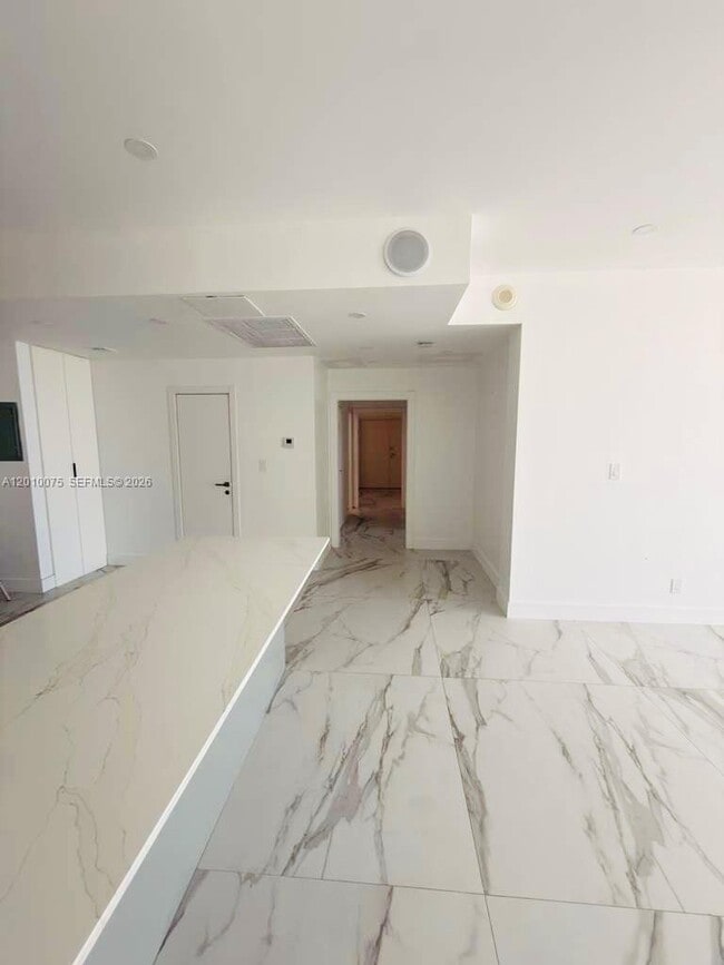 Building Photo - 19370 Collins Ave