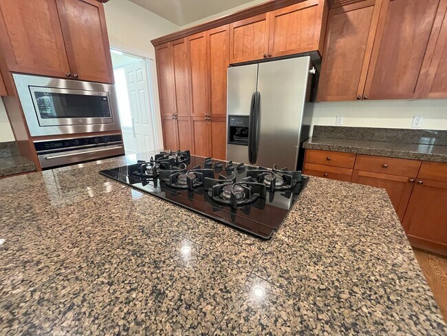 Building Photo - Elegant 5-Bedroom + Bonus Room Home with Modern Upgrades and Serene Outdoor Space