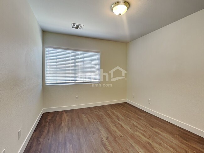 Building Photo - 10749 Artesia Wells St