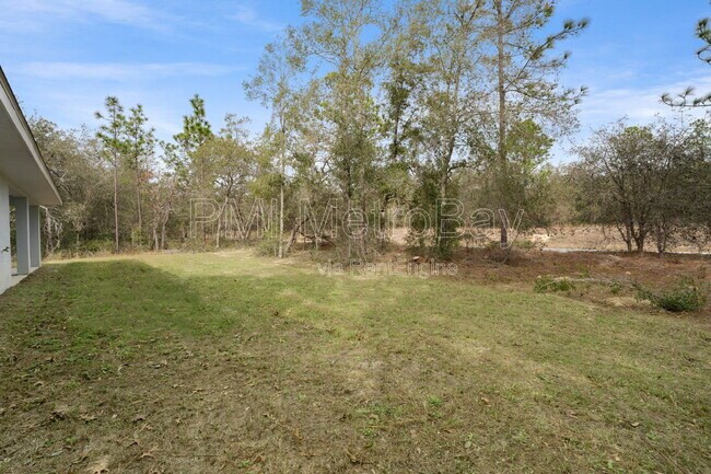 Building Photo - 9461 N Sandree Dr