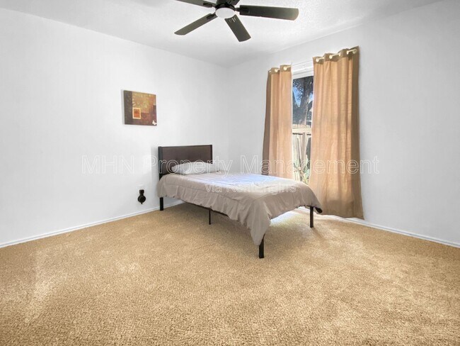 Building Photo - 9609 Woodland Hills