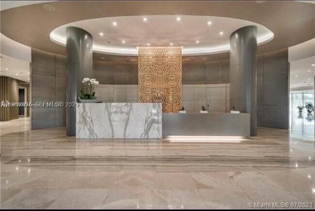 Building Photo - 10275 Collins Ave