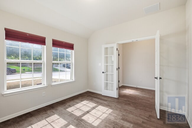 Building Photo - 8336 Paola St