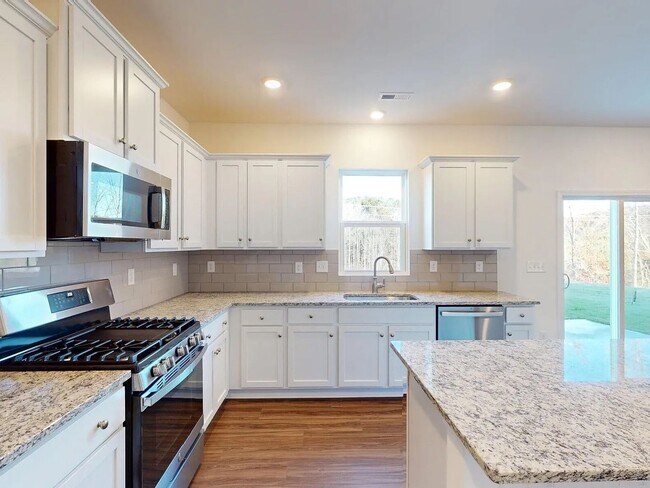 Building Photo - FIRST MONTH IS ON US   CHARMING 4- BEDROOM HOME IN LAURELBROOK COMMUNITY