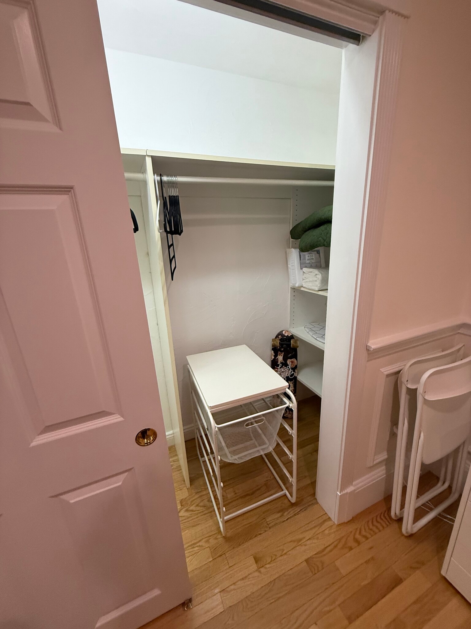 living space closet - hangers, wire baskets for laundry or storage, new linens, built in shelves - 382 Riverway St