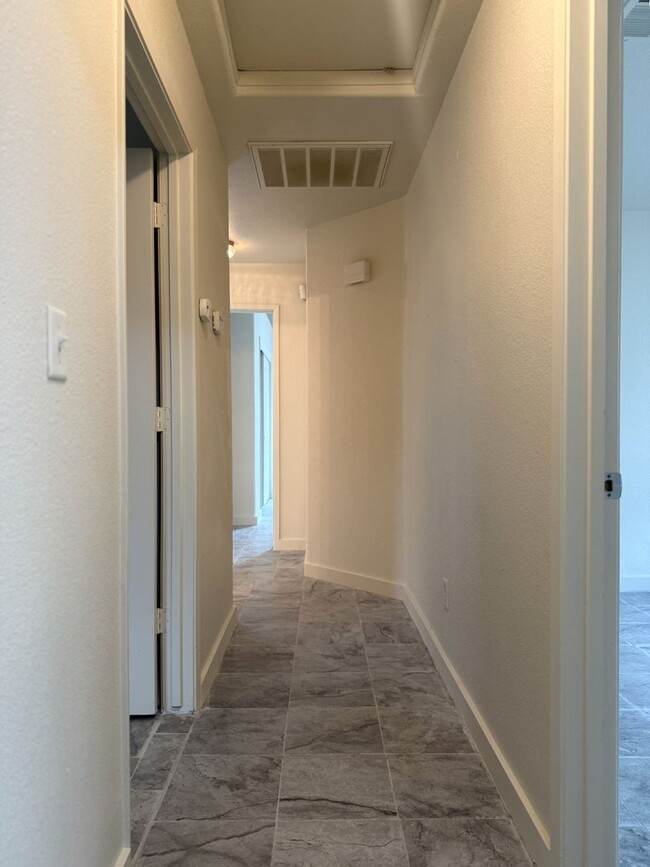 Building Photo - Available Now!!! With fresh paint and new ...