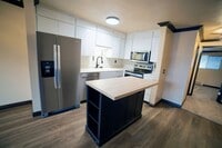 Building Photo - $300 Off! Quiet Top Floor 1 Bedroom Condo in Gated Tukwila Community