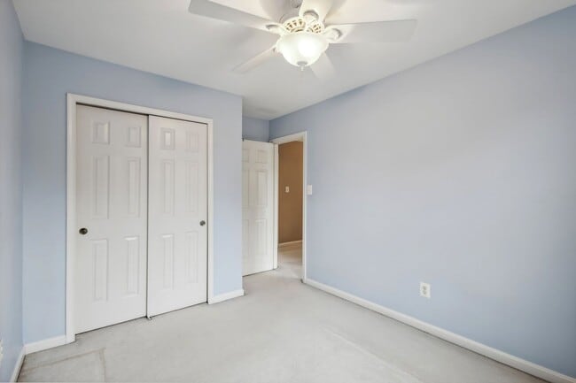 Building Photo - Modern Brick End-Unit Townhome with Stunning Upgrades and Serene Wooded Views