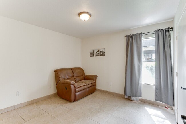 Building Photo - Bright First-Floor 2-Bedroom Condo with Private Patio in Silverado Ranch!