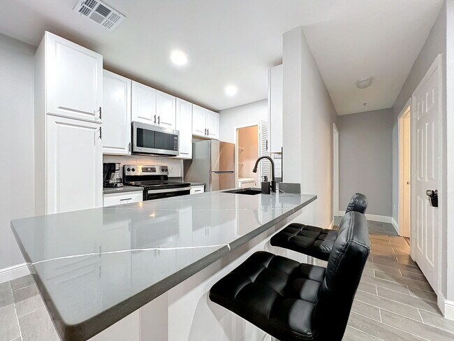 Building Photo - South Kirkman Road, Orlando, FL 32811 - 2 BR 2 BA condo