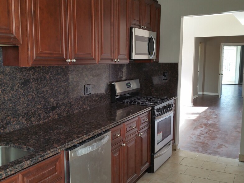 Building Photo - 1303 W Pratt Blvd