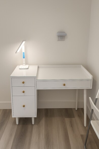 desk with charging station - 2415 SW 64th Ave