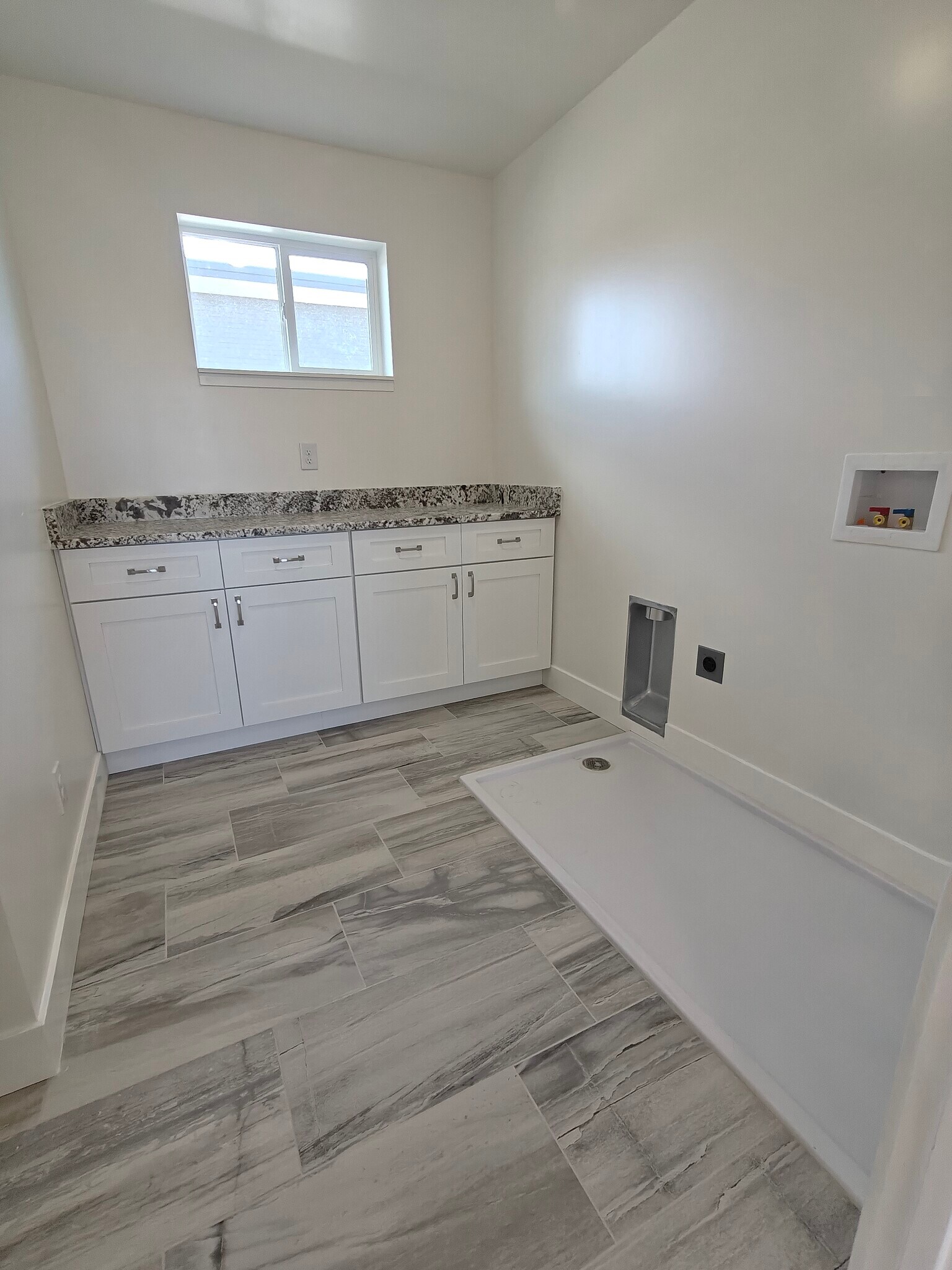 Laundry and Storage - 6662 S Highland Dr