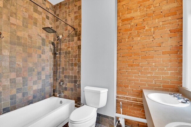 Building Photo - Architecturally Stunning Curtis Park Townhome With Historic Charm