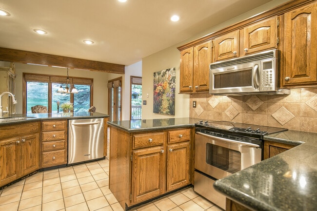 Building Photo - Breathtaking Three Bedroom Townhouse In The Pinery On The Golf Course