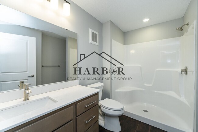 Building Photo - Brand NEW Caroline Apartments 201 -  Move ...
