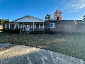 Building Photo - Introducing a charming 3-bedroom, 2-bathro...