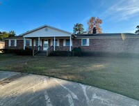 Building Photo - Introducing a charming 3-bedroom, 2-bathro...