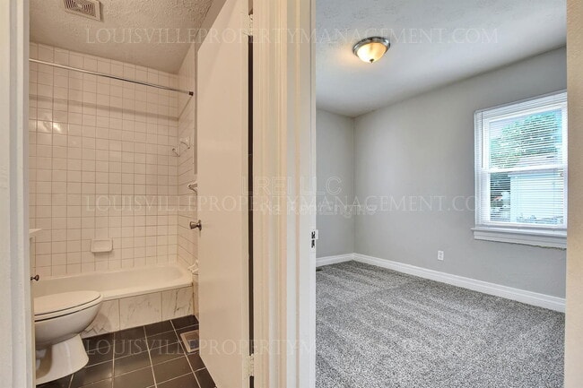 Building Photo - 6604 Miles Ave