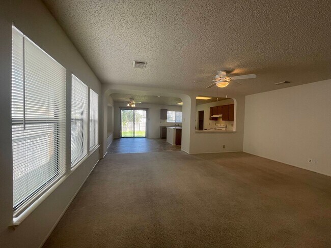 Building Photo - NICE 3 BEDROOM FEATURING AN ISLAND KITCHEN...
