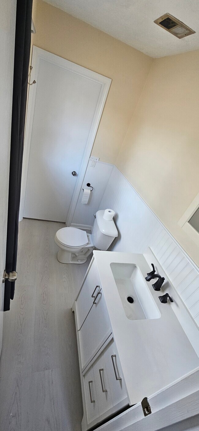 Half Bathroom. Please note that rooms are larger than they appear due to how I photographed them. - 578 Tyler St