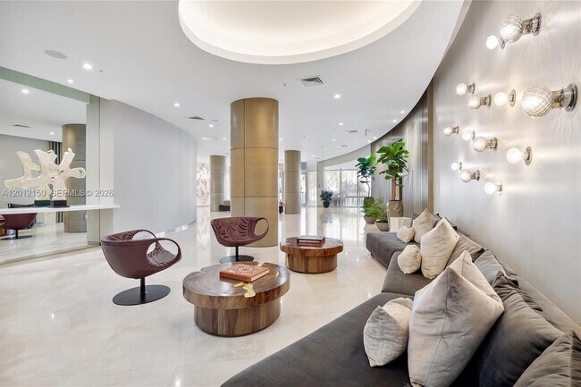 Building Photo - 10275 Collins Ave