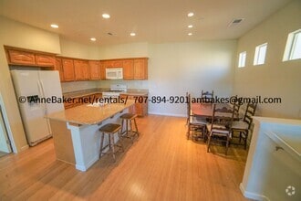 Building Photo - Lofty Living in Cloverdale's the Gardens a...