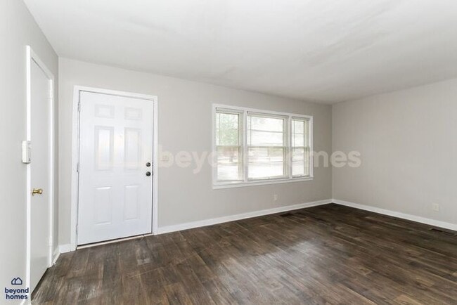 Building Photo - Updated Bungalow with Massive Deck and Fully Fenced Yard!