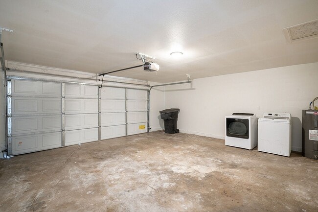 Building Photo - Updated home with large backyard & 2 car g...