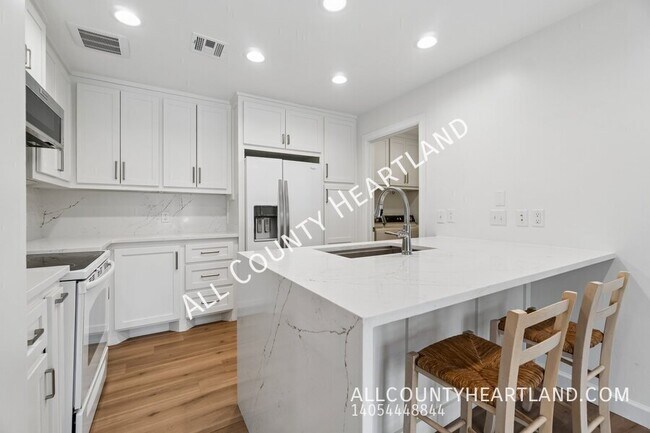 Building Photo - 9009 N May Ave