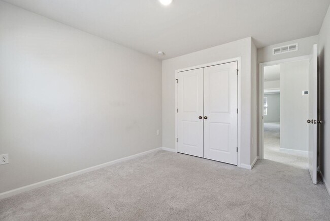 Building Photo - Upgraded 3BR Townhome in Wake Forest | Open Layout, Garage & Resort-Style Amenities