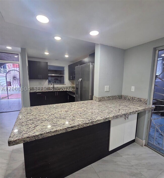 Building Photo - 4241 W 10th Ln