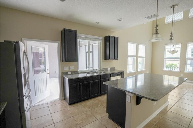 Building Photo - Beautiful 4BR/3.5BA Home with Dual Primary Suites in Harmony for Rent!