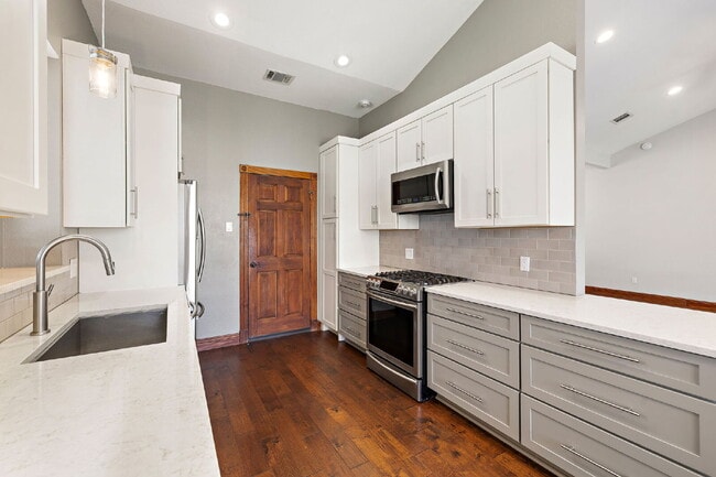 Building Photo - Renovated South Austin Stunner on a Private Corner Lot + Massive Backyard