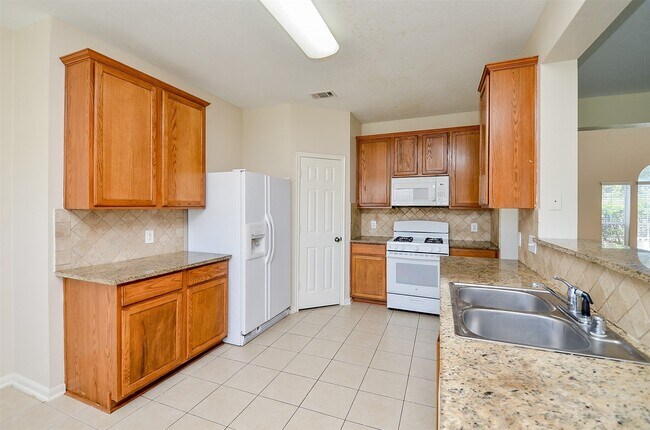 Building Photo - 7415 Oakwood Canyon Dr