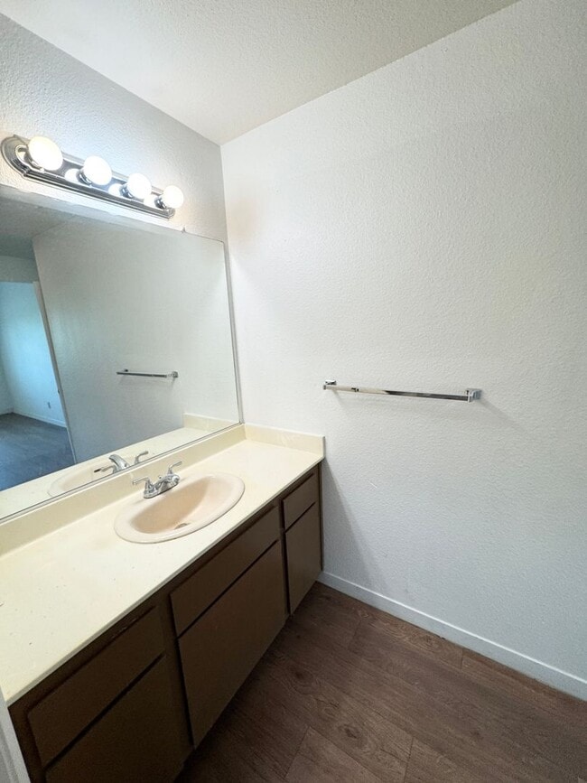 Building Photo - Bright Vaulted-Ceiling Condo in Gated Community • Pool • W/D Included • Move-In Ready