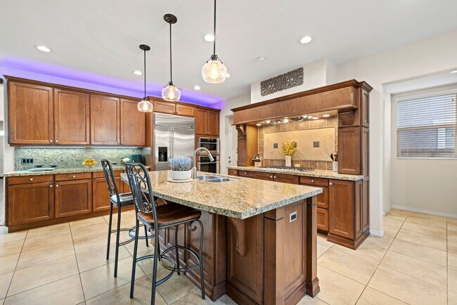 Building Photo - Luxurious 5-Bedroom Pool Home with Solar &...