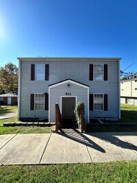 Building Photo - Spacious 4-Bedroom Duplex with Modern Amen...
