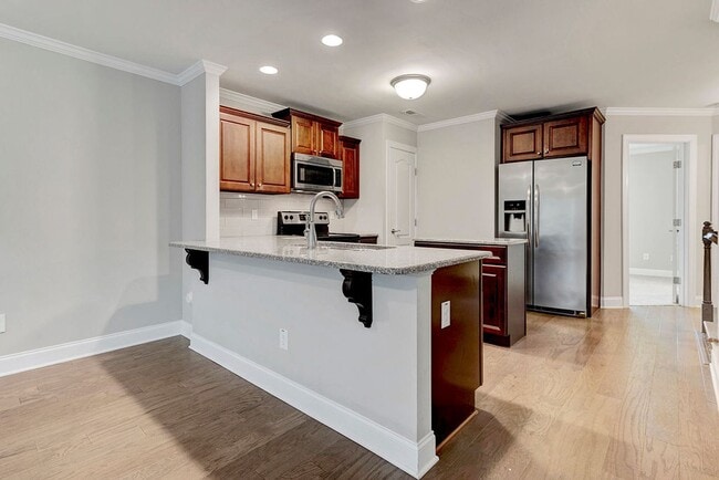 Building Photo - PRICE REDUCED - MOVE IN READY! – Gorgeous 4BR/4BA Townhome in Villages of Apex, 1 mile to DT Apex!